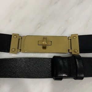 Leather, adjustable black belt with gold buckle
